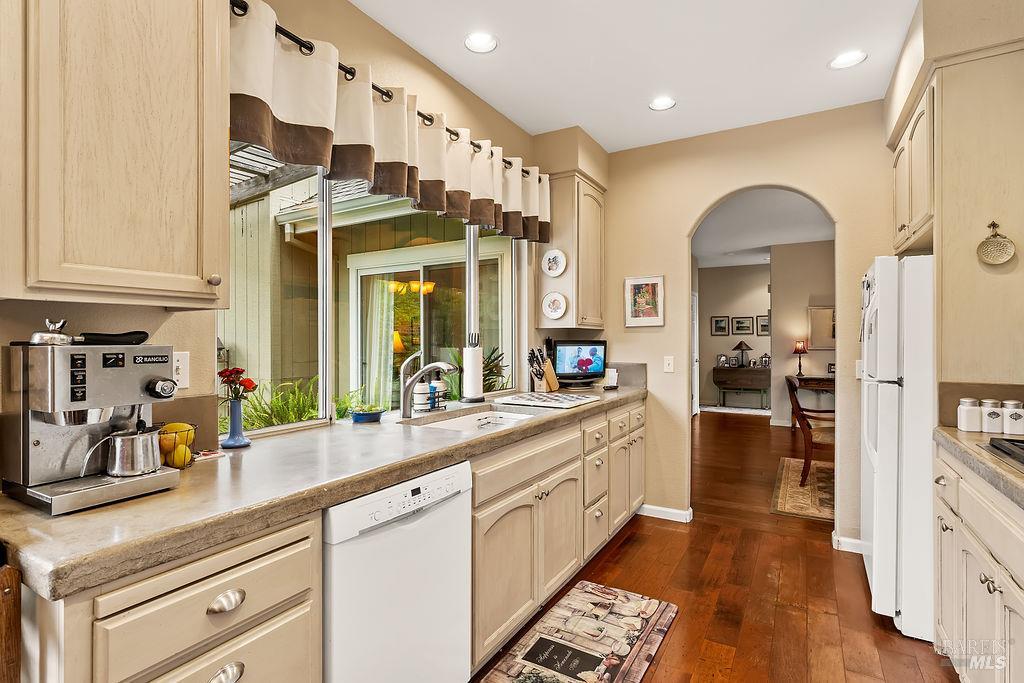 6252 Meadowstone Drive Santa Rosa, CA 95409 - Photo 24 of 33 a kitchen with stainless steel appliances granite countertop a sink and cabinets