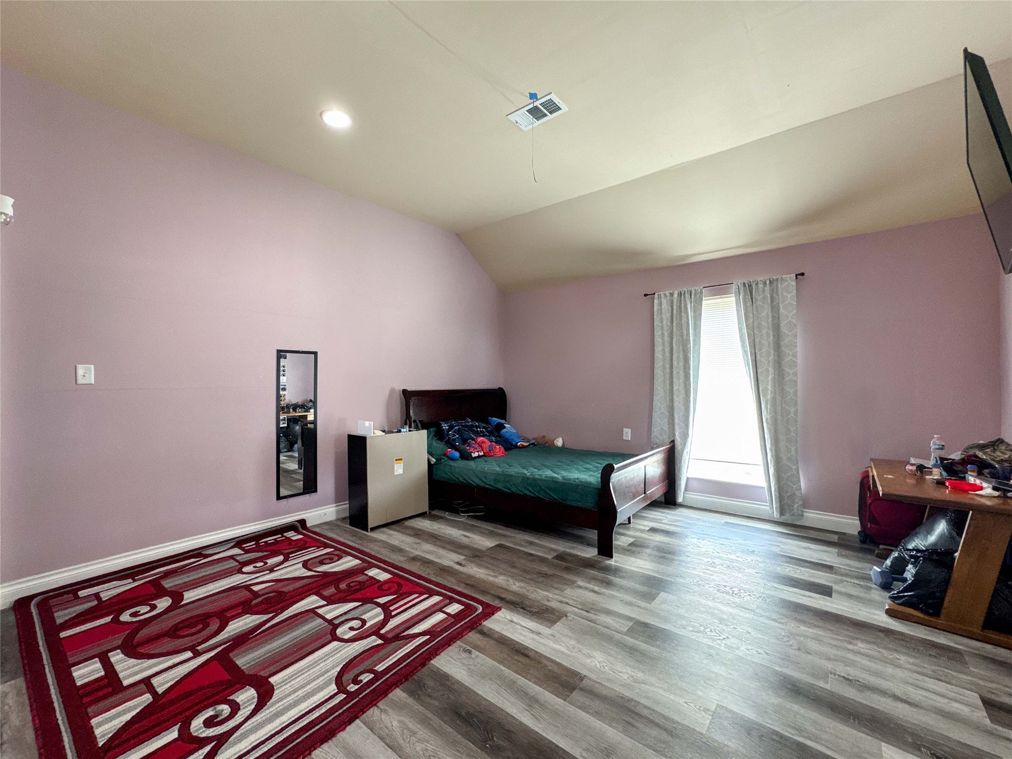 1060 County Road 5021 Cleveland, TX 77327 - Photo 2 of 34 a living room with furniture and a wooden floor