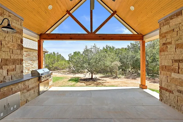 a view of swimming pool with a yard