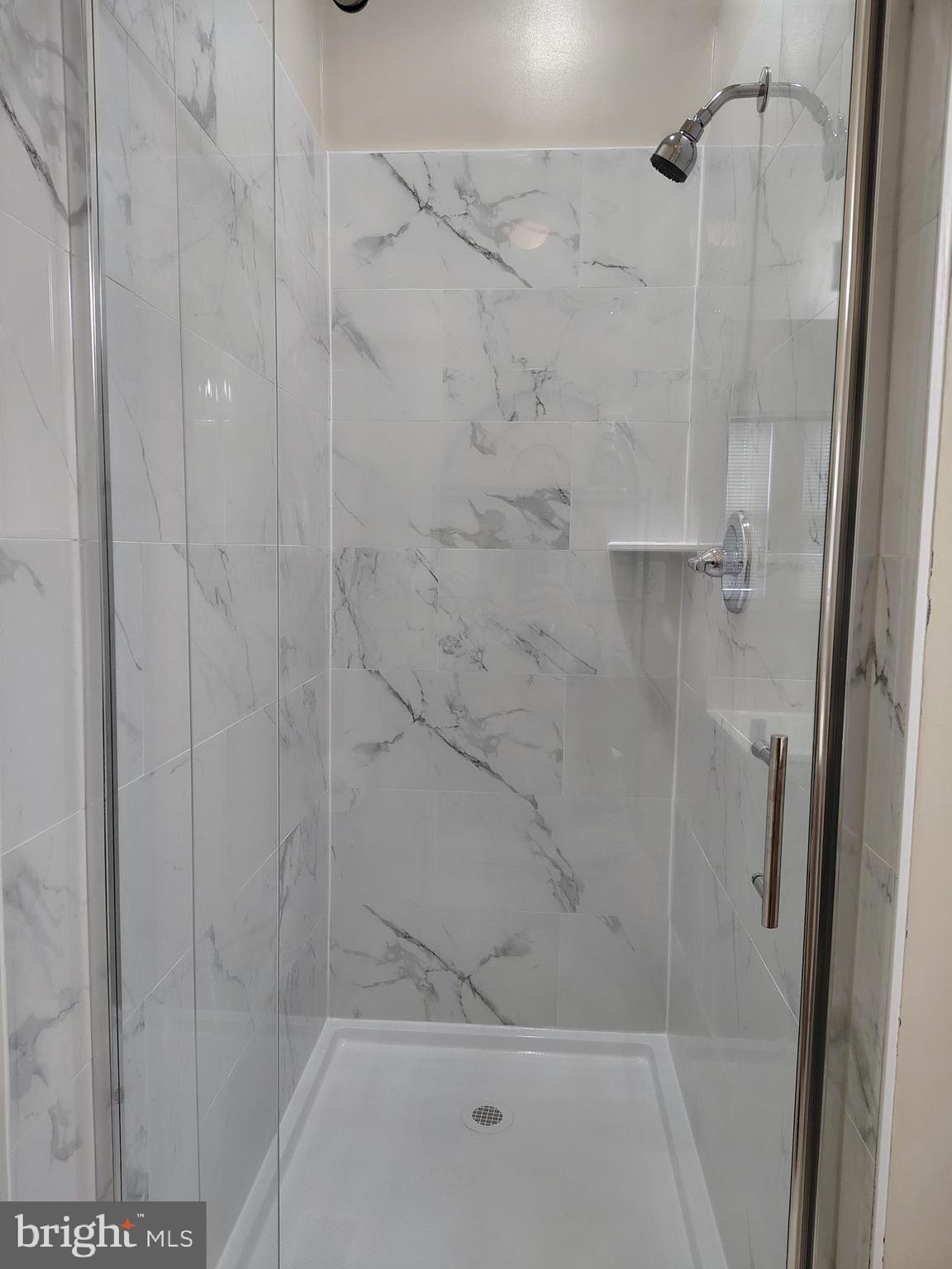 444 Delaware Road Frederick, MD 21701 - Photo 14 of 23 a bathroom with a shower