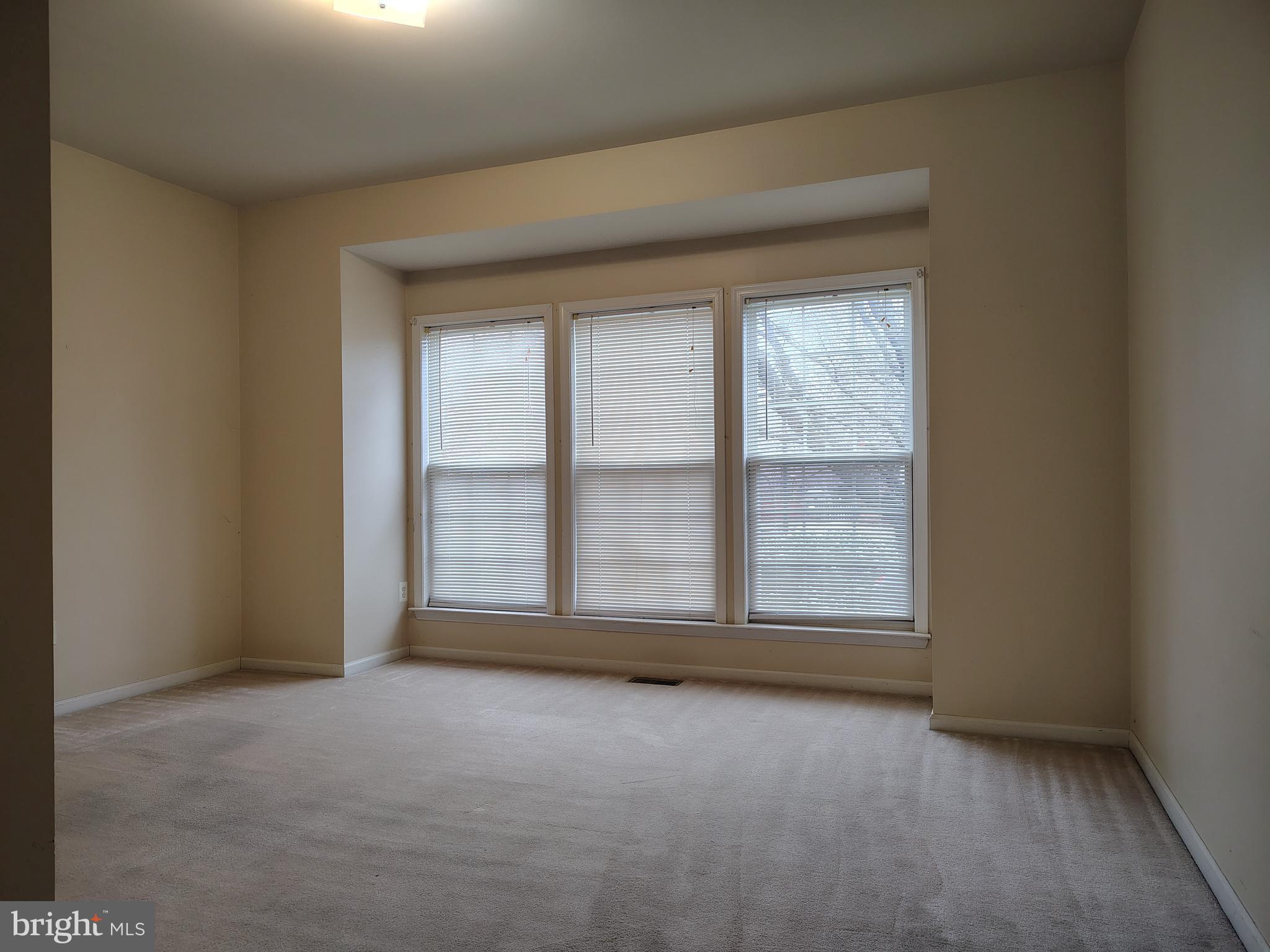 444 Delaware Road Frederick, MD 21701 - Photo 15 of 23 an empty room with a empty space and window