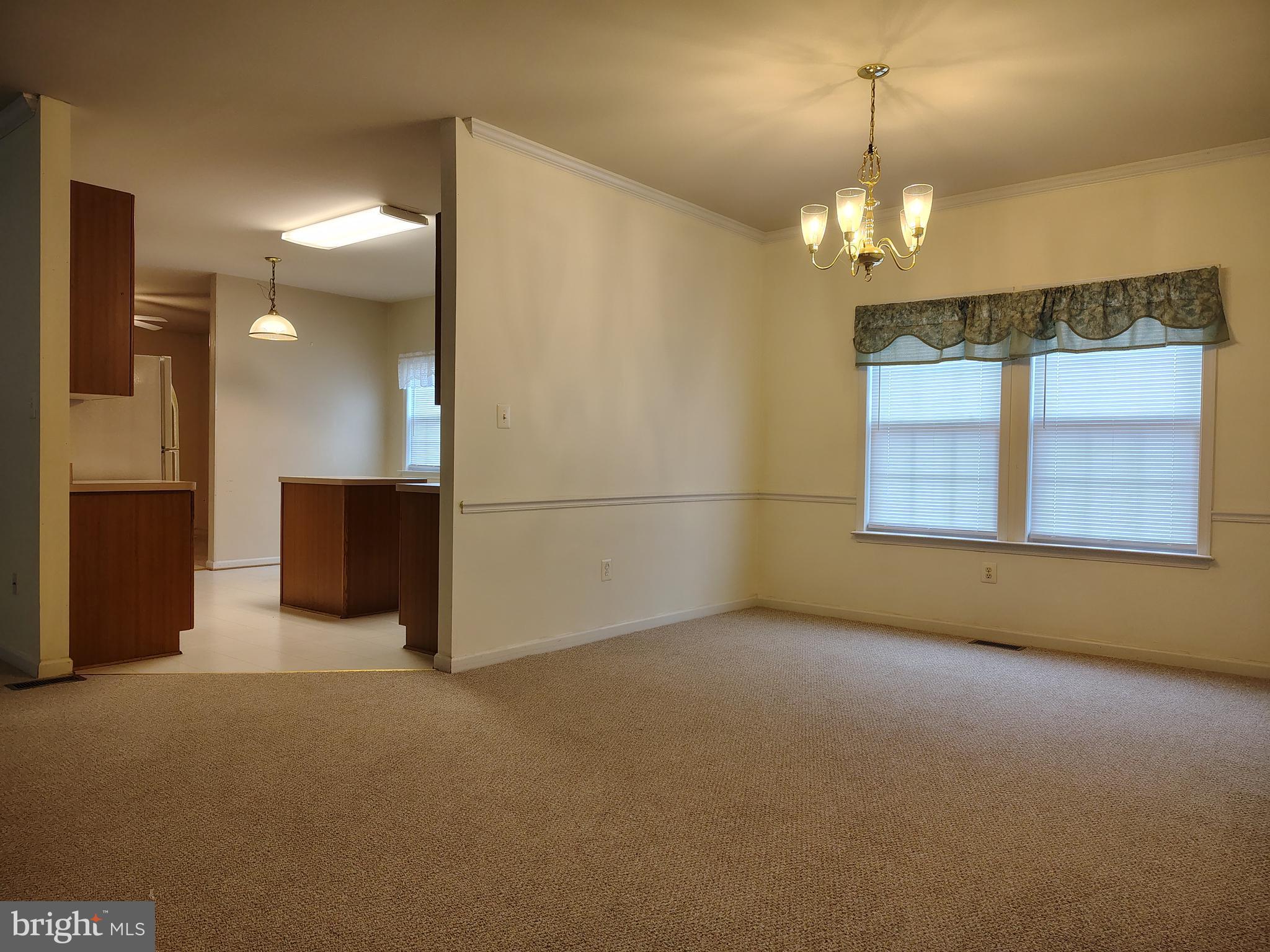 444 Delaware Road Frederick, MD 21701 - Photo 5 of 23 a view of an empty room with a window