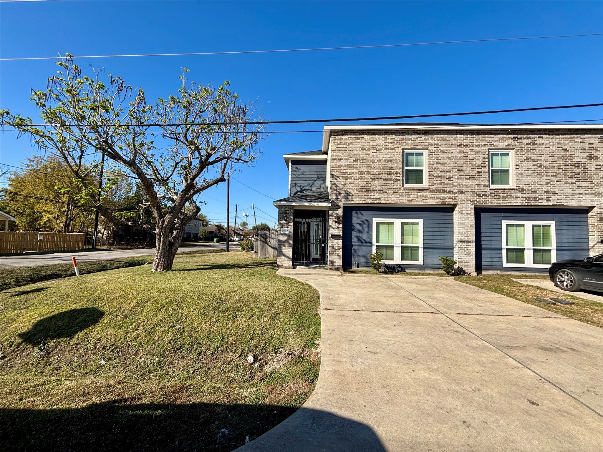 8918 Southview Street, Unit A Houston, TX 77051 - Photo 14 of 14 a view of a house with a iron fence