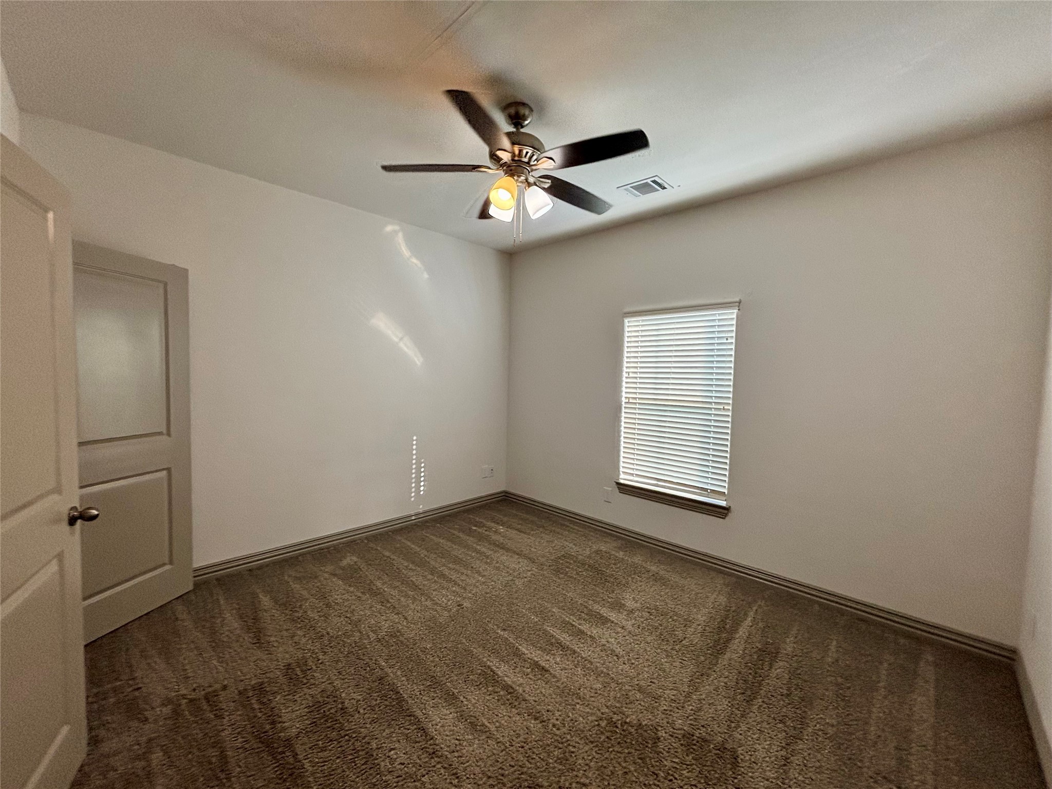 8918 Southview Street, Unit A Houston, TX 77051 - Photo 10 of 14 a view of an empty room with a window