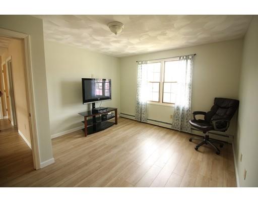 85 Family Drive Fall River, MA 02721 - Photo 18 of 31 a living room with furniture and a flat screen tv