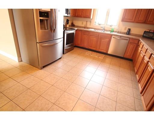 85 Family Drive Fall River, MA 02721 - Photo 25 of 31 a kitchen with stainless steel appliances granite countertop a refrigerator sink and cabinets