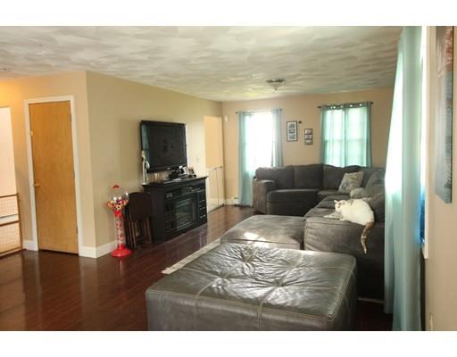 85 Family Drive Fall River, MA 02721 - Photo 10 of 31 a living room with furniture and a flat screen tv