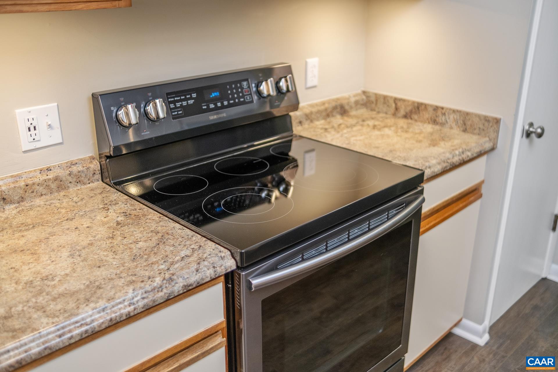 111 Turtle Creek Road, Unit 2 Charlottesville, VA 22901 - Photo 8 of 22 a view of a kitchen counter and stove