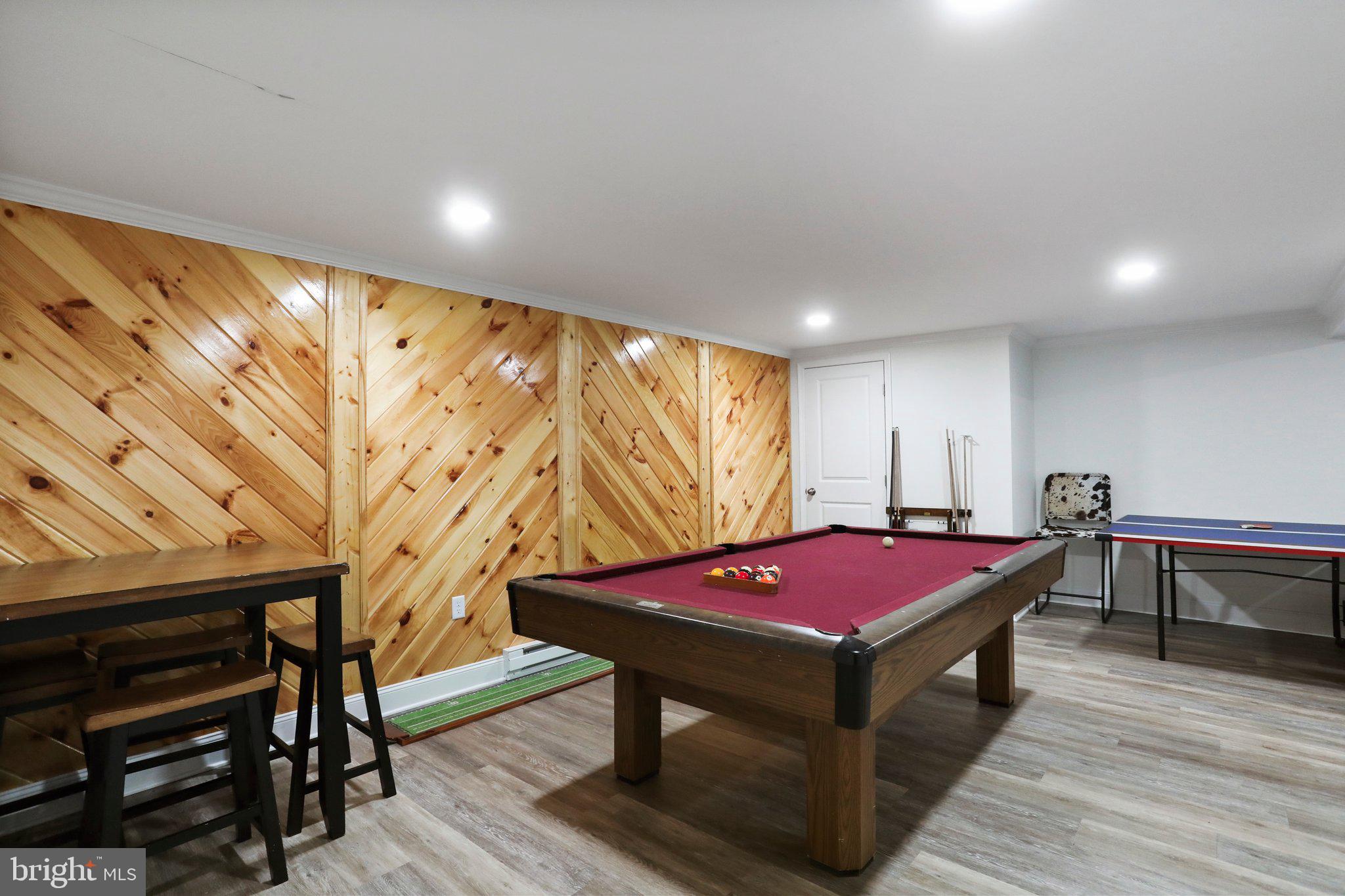130 Traveller Road Falling Waters, WV 25419 - Photo 49 of 93 Primary home lower level game room/ rec room/ gym