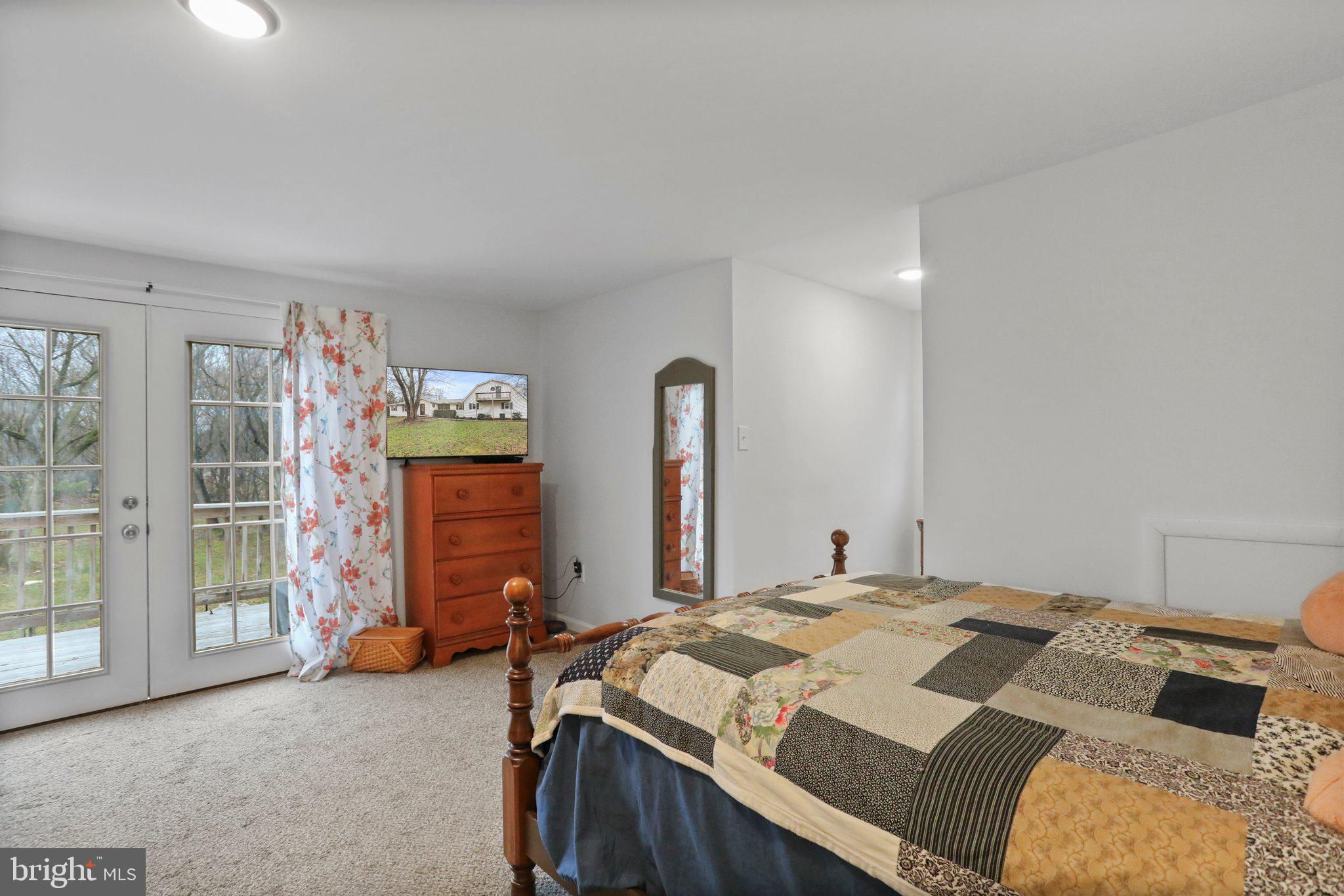 130 Traveller Road Falling Waters, WV 25419 - Photo 64 of 93 In-law suite upper level bedroom w/ deck
