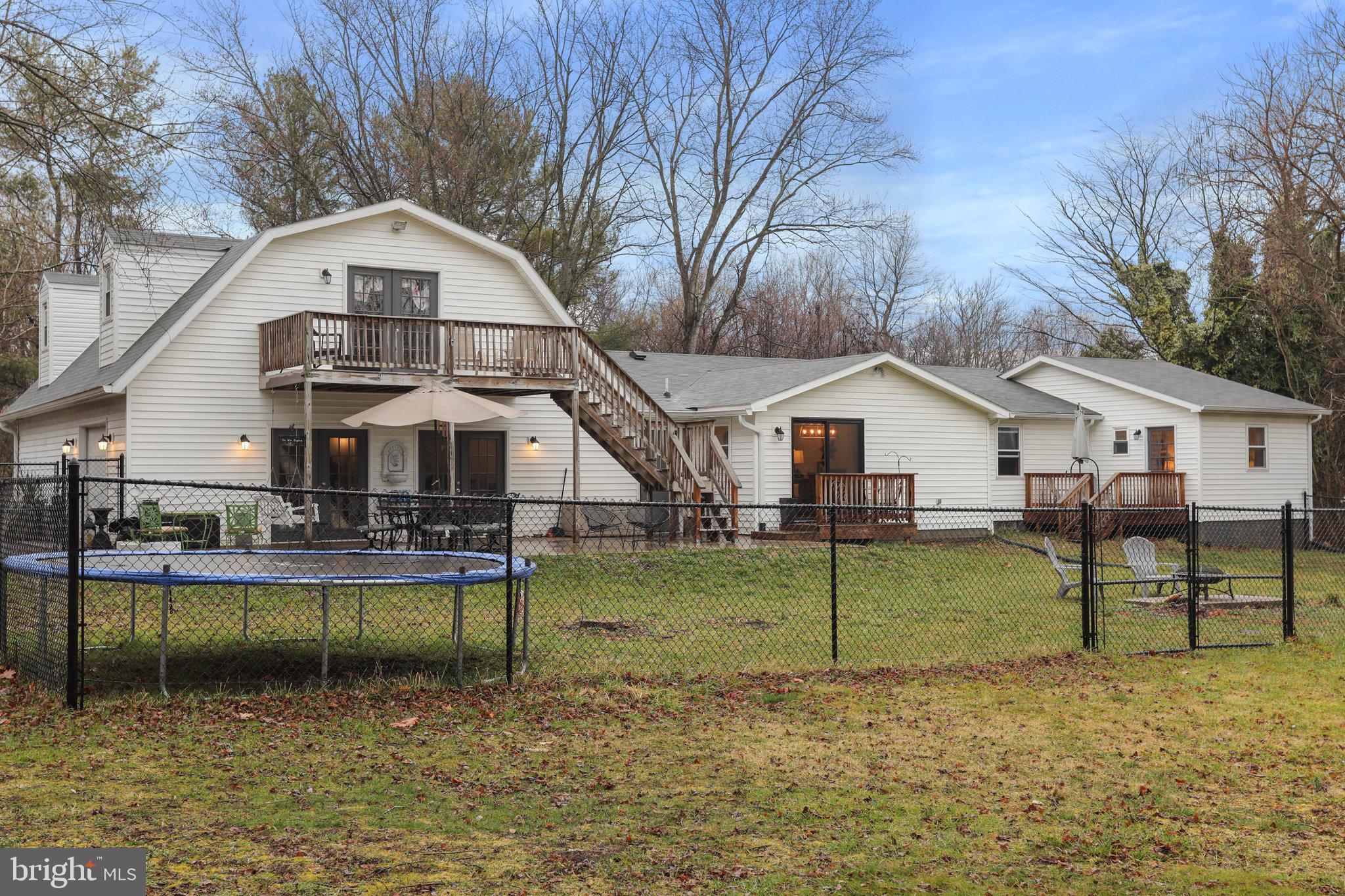 130 Traveller Road Falling Waters, WV 25419 - Photo 77 of 93 Rear of home w/ fenced area