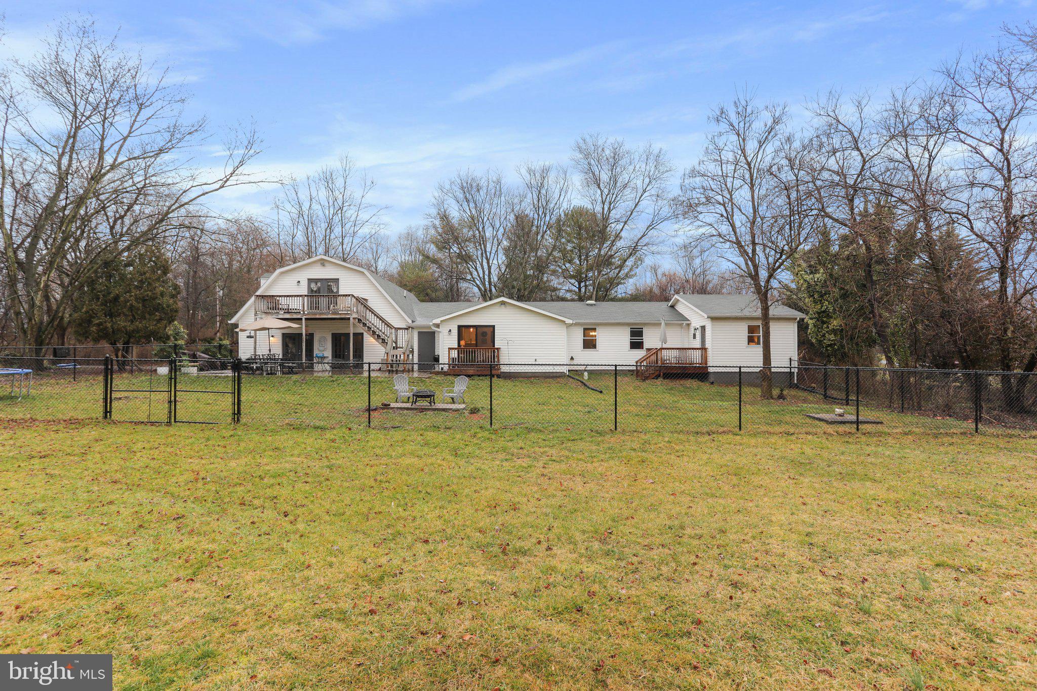 130 Traveller Road Falling Waters, WV 25419 - Photo 79 of 93 Rear of home w/ fenced area