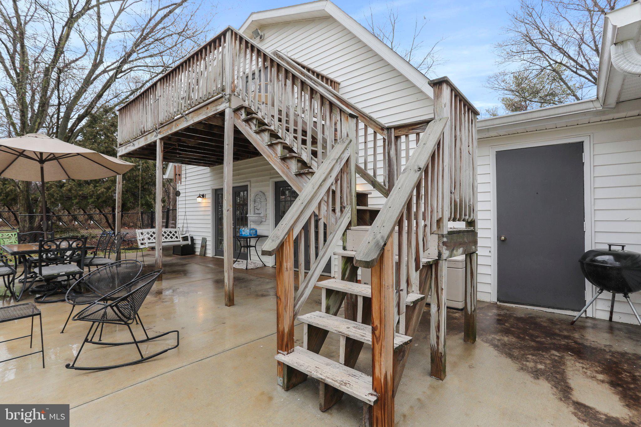 130 Traveller Road Falling Waters, WV 25419 - Photo 83 of 93 Rear view of home w/ in-law deck