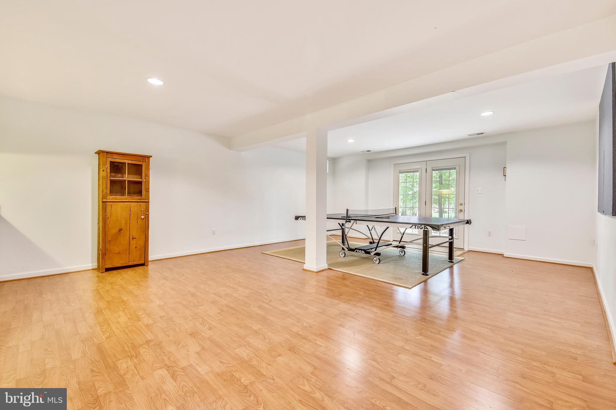 2710 Owens Road Brookeville, MD 20833 - Photo 30 of 46 Large game room with walk-out to patio