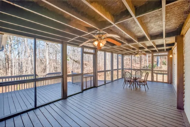 a view of a chairs and table on the wooden floor