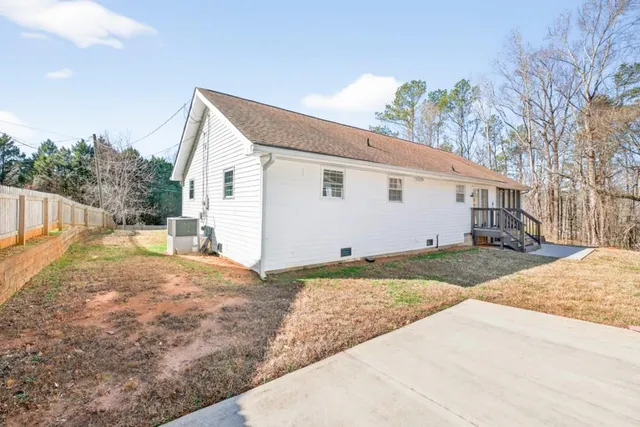 a view of backyard of house