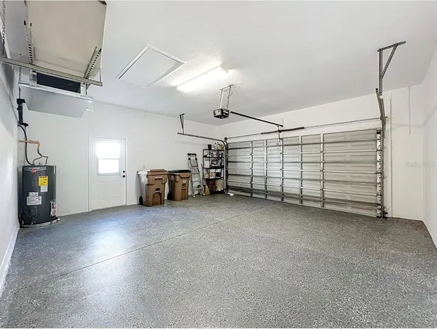 a view of a park with swings and slides