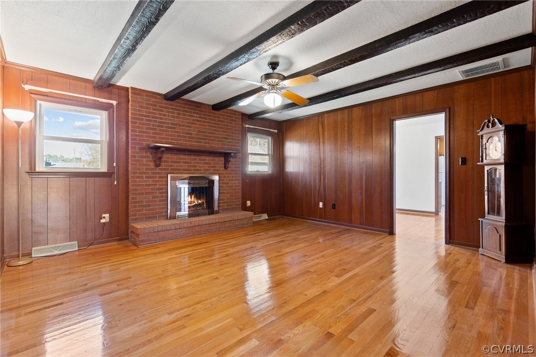 102 Meadowfield Road Yorktown, VA 23692 - Photo 5 of 21 Beamed ceilings and brick fireplace.