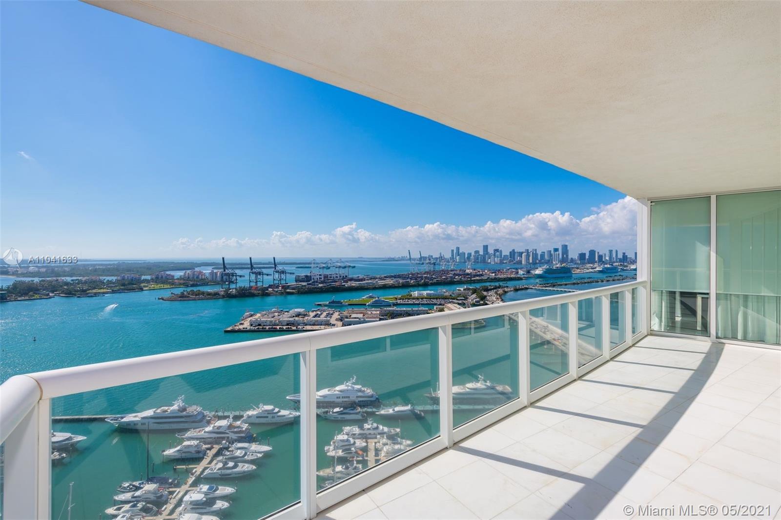 450 Alton Road, Unit 3207 Miami Beach, FL 33139 - Photo 2 of 31 a view of a balcony with city