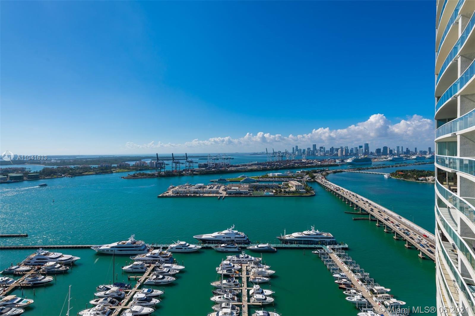 450 Alton Road, Unit 3207 Miami Beach, FL 33139 - Photo 19 of 31 a view of a lake with a city
