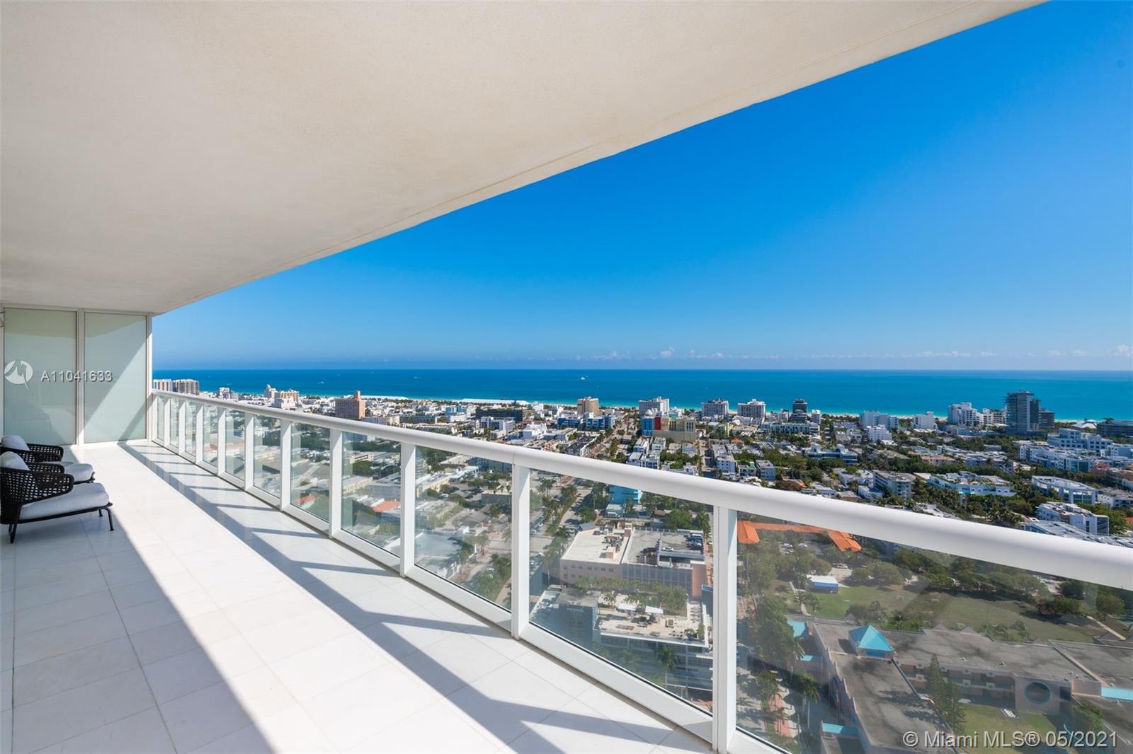 450 Alton Road, Unit 3207 Miami Beach, FL 33139 - Photo 23 of 31 a view of a balcony with city view