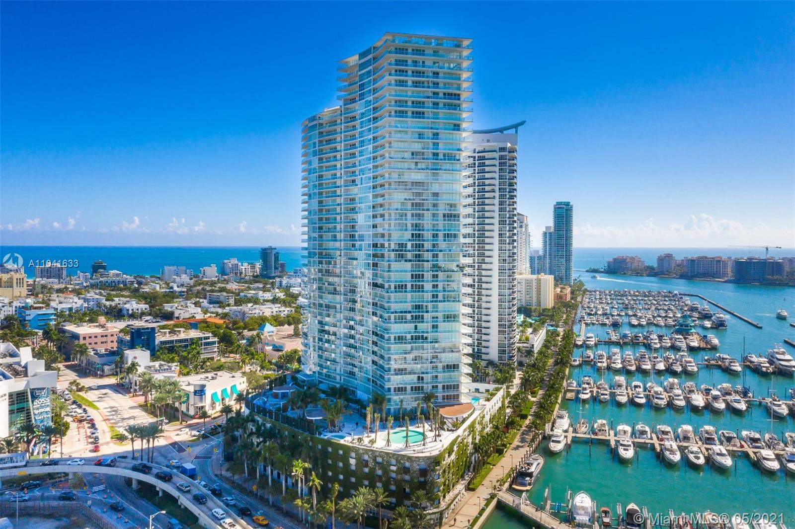 450 Alton Road, Unit 3207 Miami Beach, FL 33139 - Photo 28 of 31 a view of a city with tall buildings