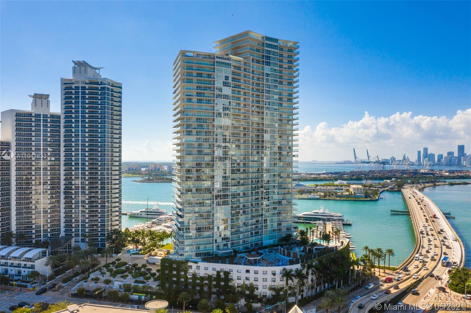 450 Alton Road, Unit 3207 Miami Beach, FL 33139 - Photo 30 of 31 a view of a city with tall buildings