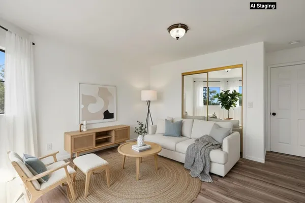 a bedroom with a bed and a table