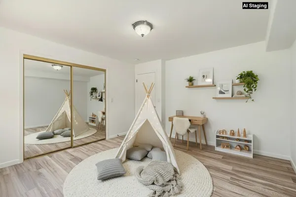 a view of cabinets and wooden floor