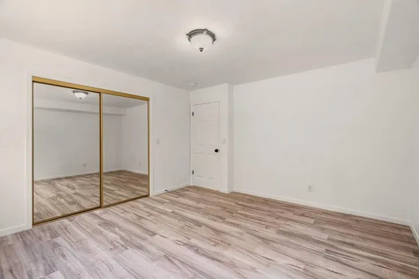 a view of a terrace with wooden floor and fence