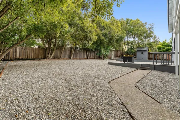 a view of a house with a garden