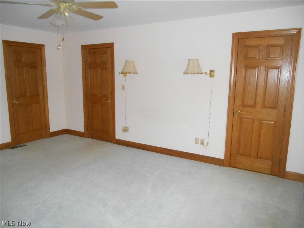 800 Bell Road Wooster, OH 44691 - Photo 15 of 33 The second floor bedroom with the dual entry doors on the right. On the left is the closet.