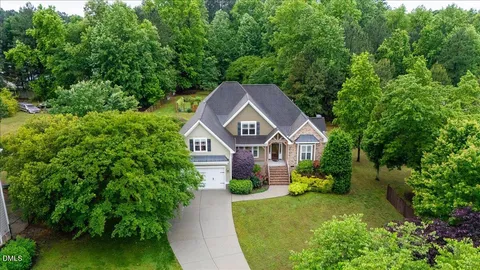a house view with a garden space