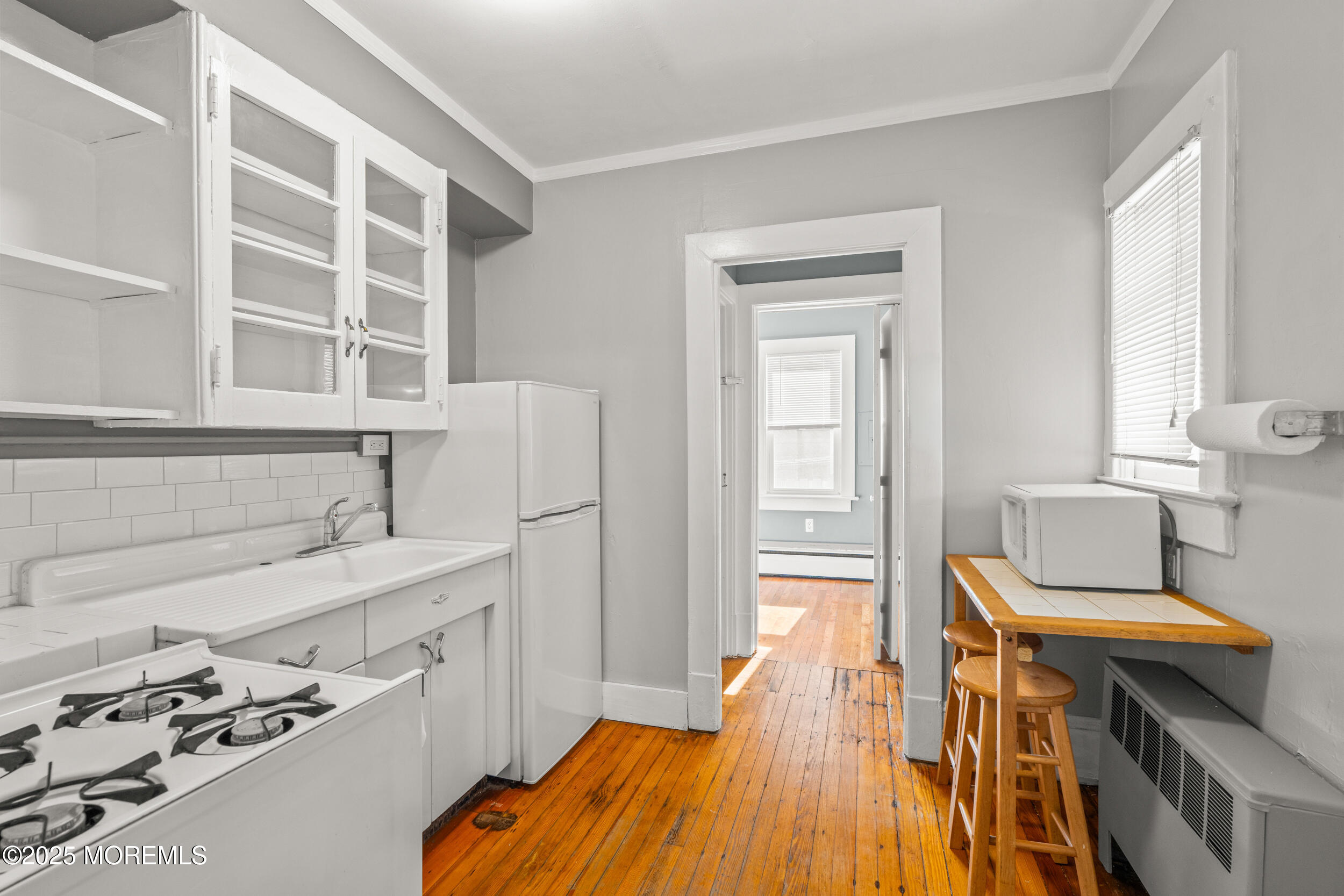 110 Mt Tabor Way Ocean Grove, NJ 07756 - Photo 22 of 71 a bathroom with a sink a toilet and a window
