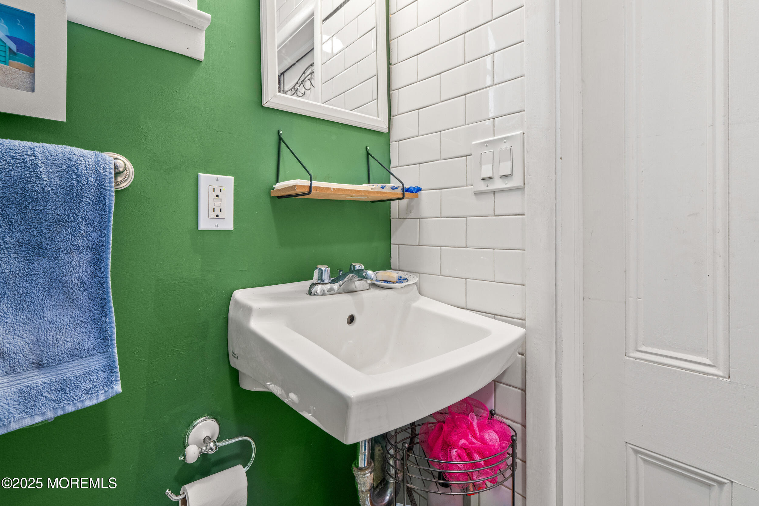 110 Mt Tabor Way Ocean Grove, NJ 07756 - Photo 36 of 71 a bathroom with a sink and a mirror