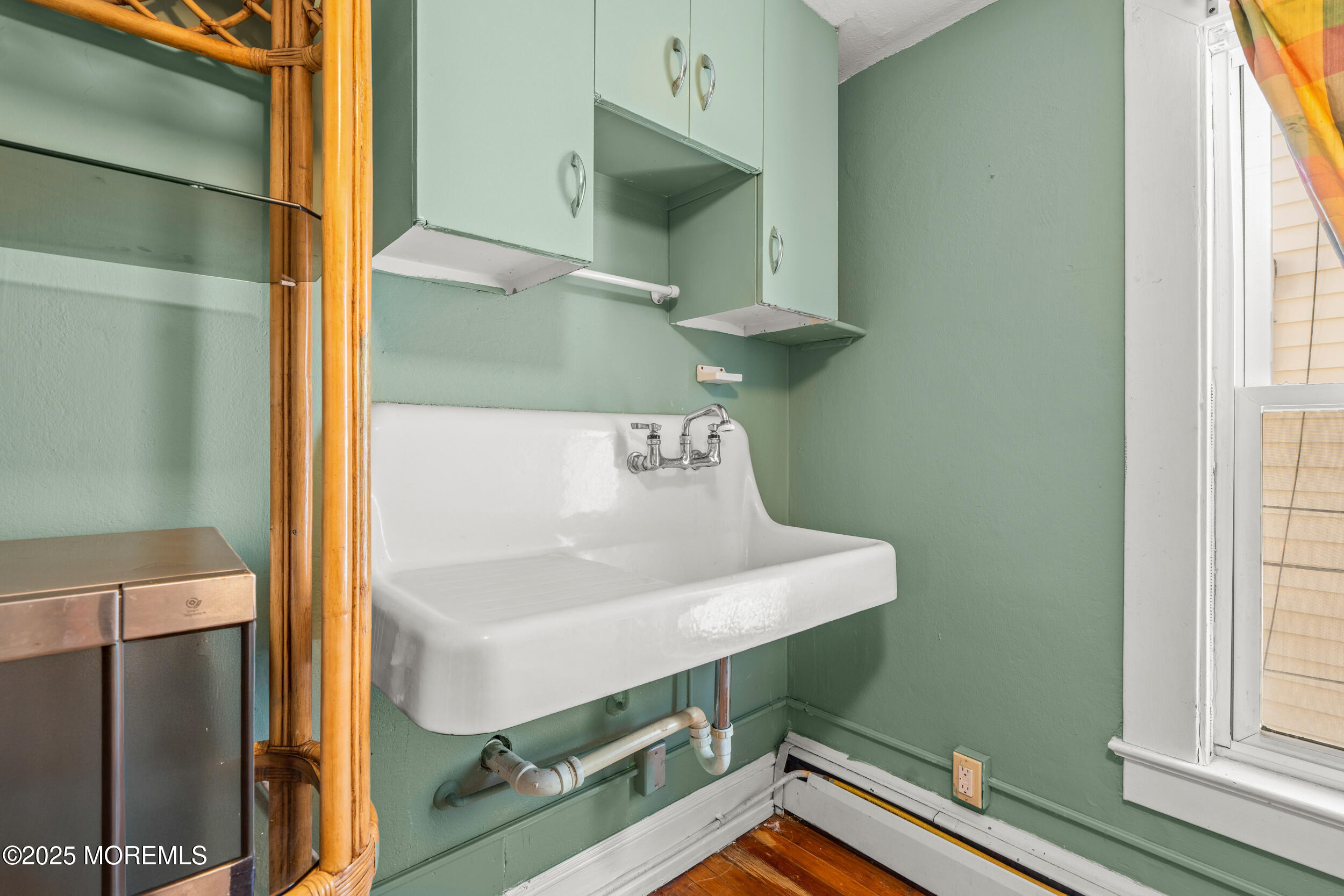 110 Mt Tabor Way Ocean Grove, NJ 07756 - Photo 42 of 71 a bathroom with a sink and a mirror