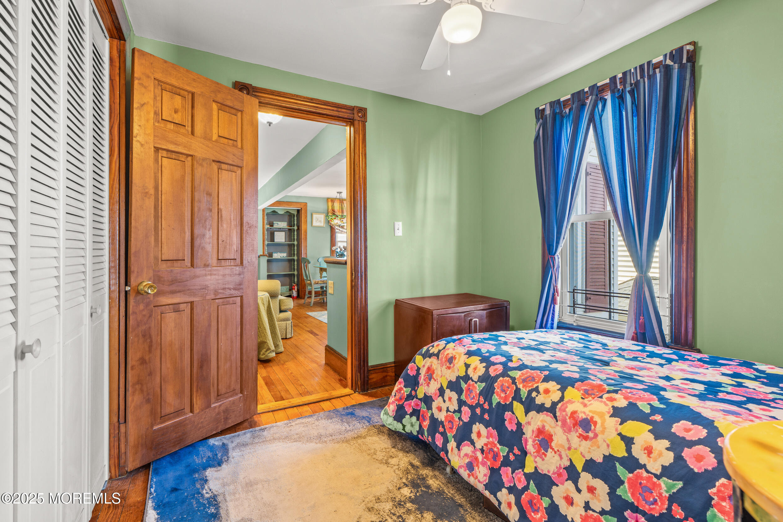 110 Mt Tabor Way Ocean Grove, NJ 07756 - Photo 51 of 71 a bedroom with a bed and a dresser next to a window