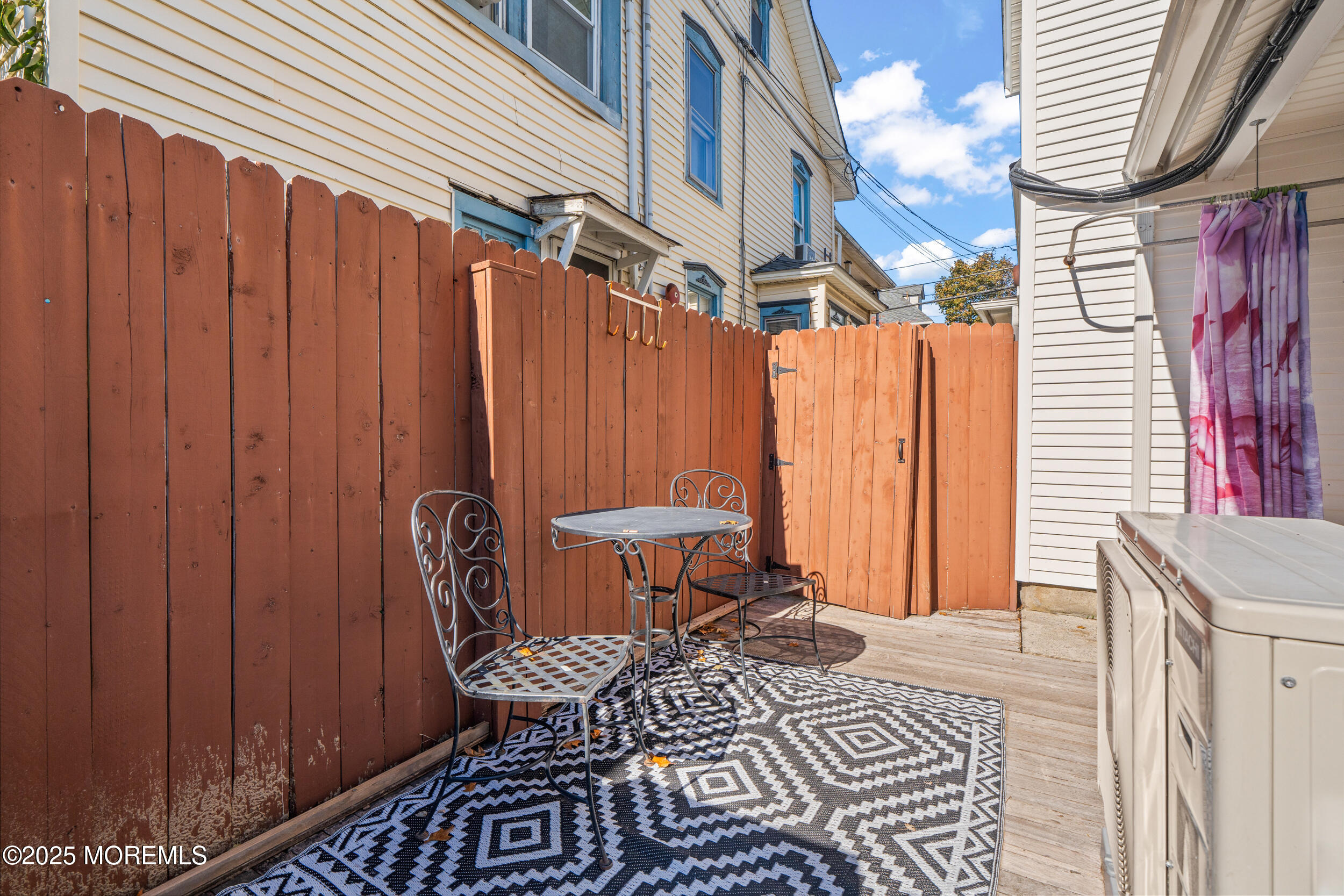 110 Mt Tabor Way Ocean Grove, NJ 07756 - Photo 67 of 71 a view of a patio with a table and chairs