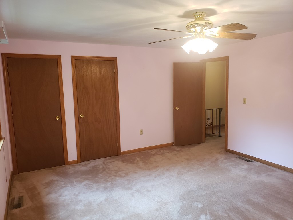 68 Lawton Road, Unit B Shirley, MA 01464 - Photo 9 of 14 a view of a chandelier in a room