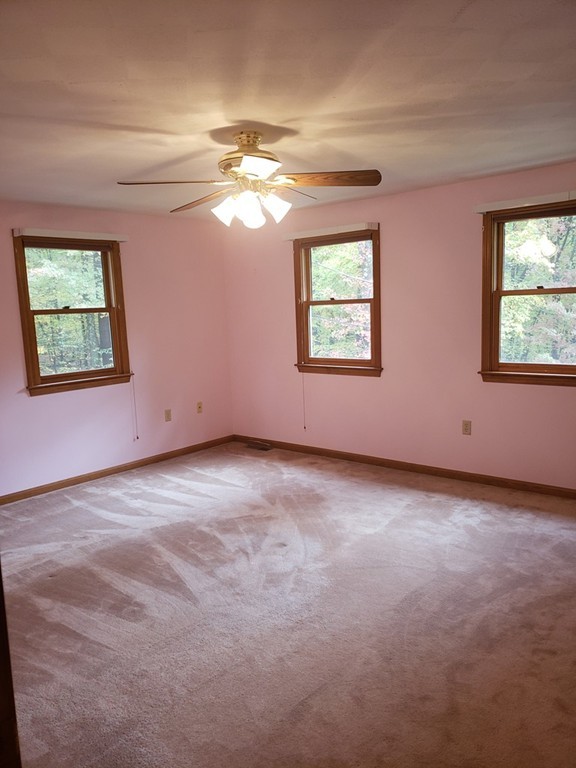 68 Lawton Road, Unit B Shirley, MA 01464 - Photo 10 of 14 a view of an empty room with a window
