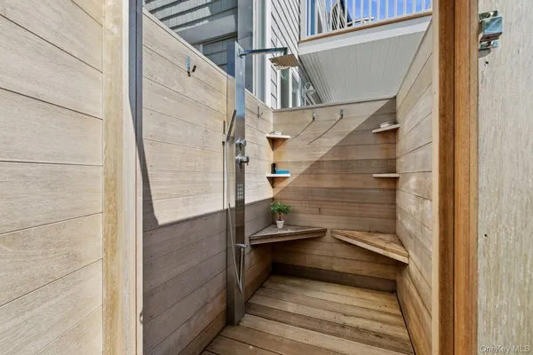 a balcony with furniture and city view