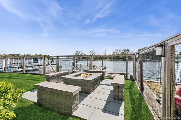a view of a kitchen with a stove and a microwave