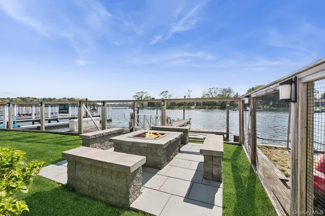 a view of a kitchen with a stove and a microwave