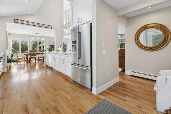 a view of entryway with bedroom and windows