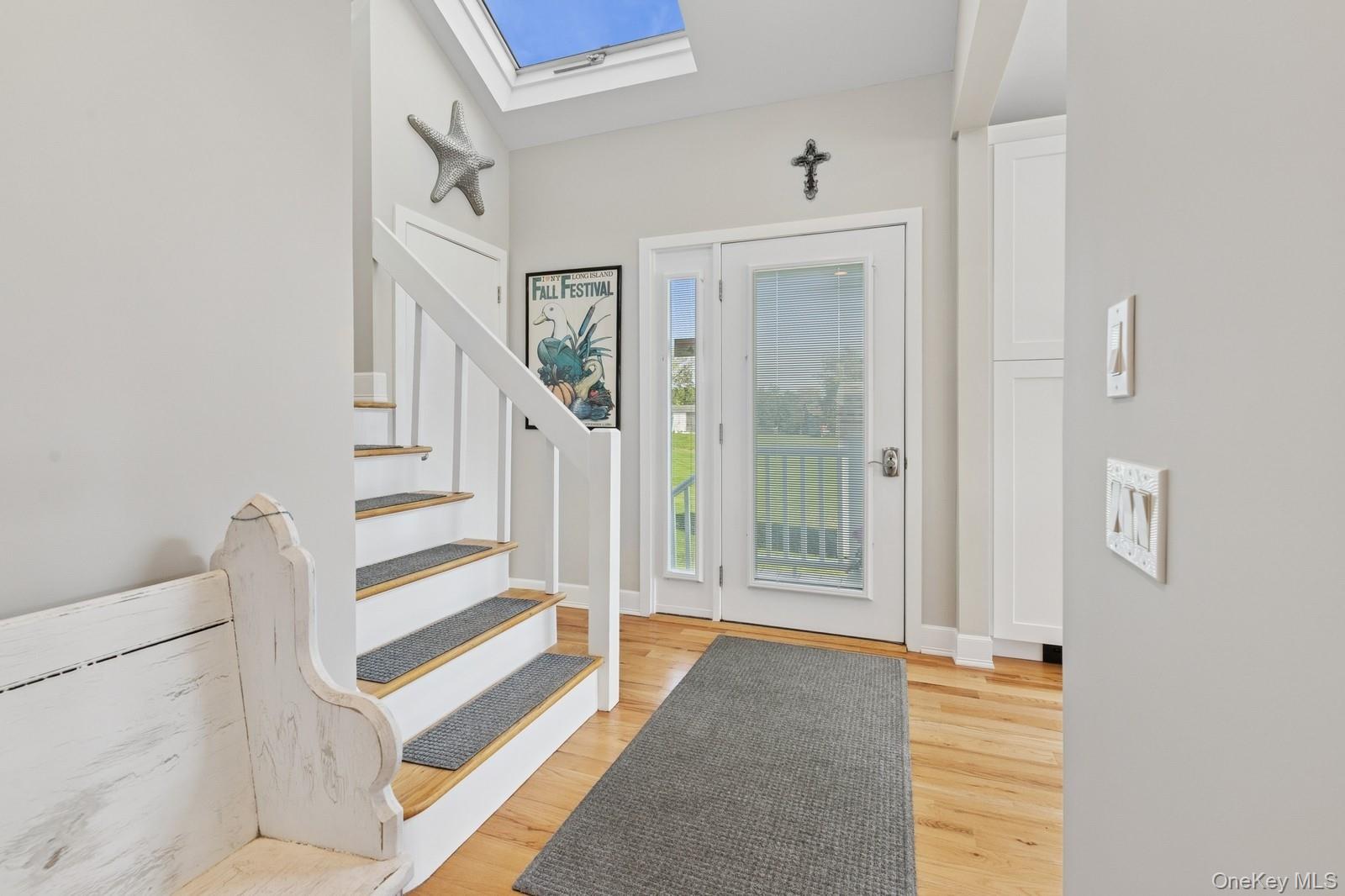 81 Beach Road Aquebogue, NY 11901 - Photo 18 of 34 a view of entryway with bedroom and windows
