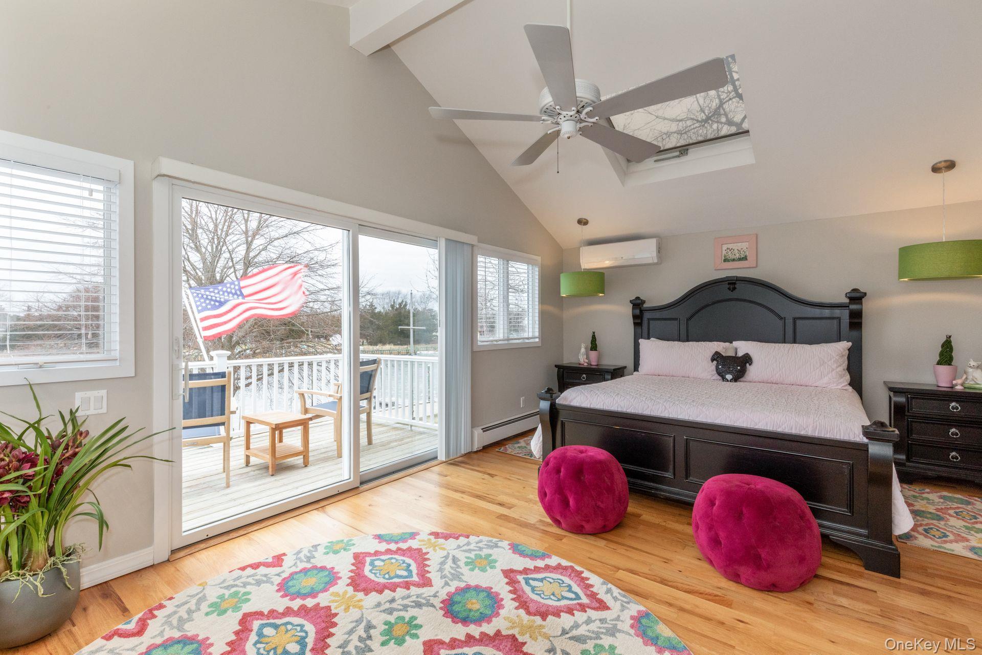 81 Beach Road Aquebogue, NY 11901 - Photo 29 of 34 a bedroom with a bed and window