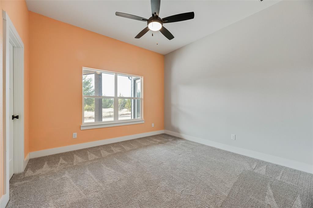 2335 Providence Way Nevada, TX 75173 - Photo 12 of 18 a view of an empty room with a window