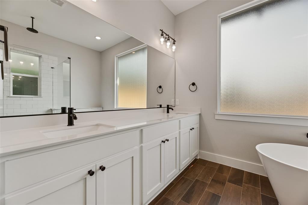 2335 Providence Way Nevada, TX 75173 - Photo 14 of 18 a bathroom with a double vanity sink mirror and toilet