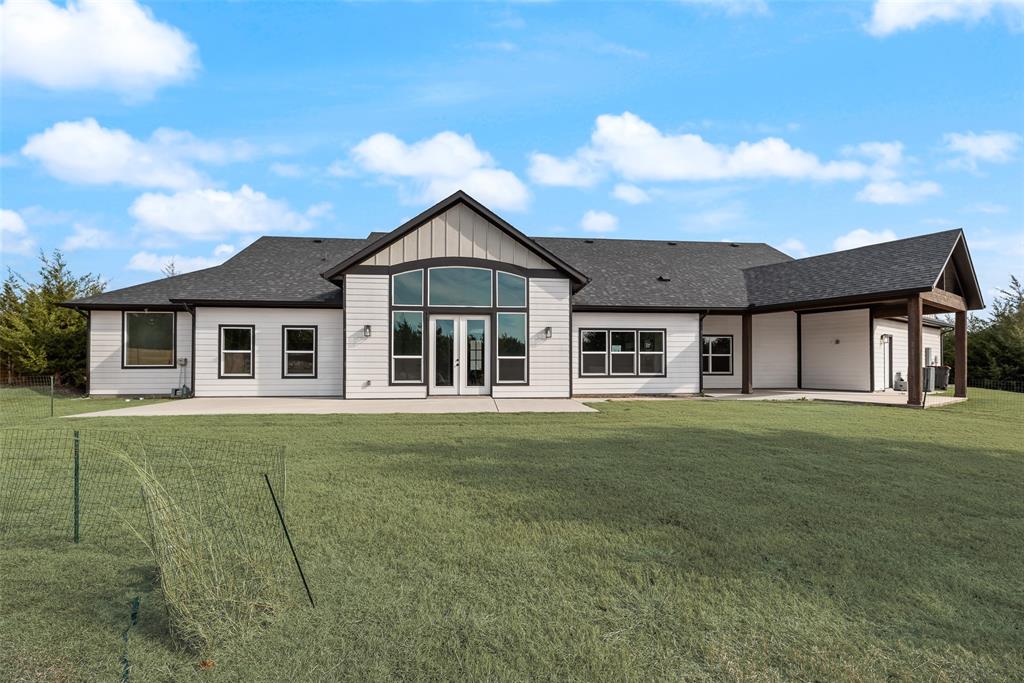 2335 Providence Way Nevada, TX 75173 - Photo 16 of 18 a front view of a house with a garden