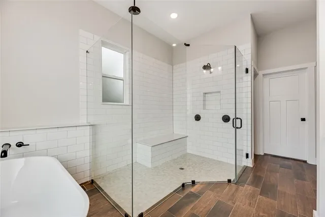 a bathroom with a sink and a shower